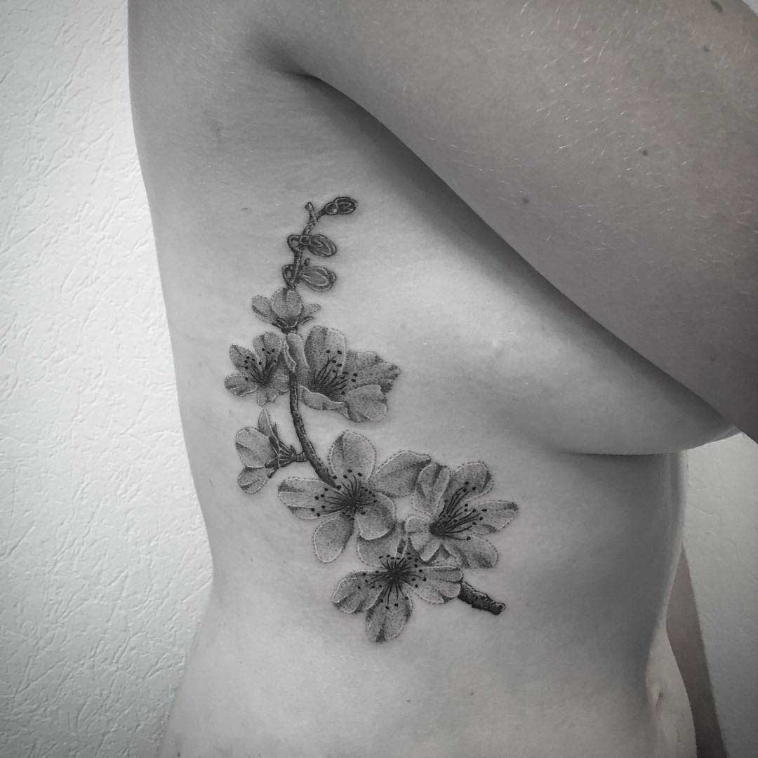 ribs tattoo cherry blossom